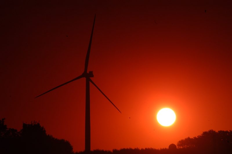 Sunrise over Carleton's wind turbine