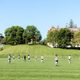 soccer plays practicing on a field