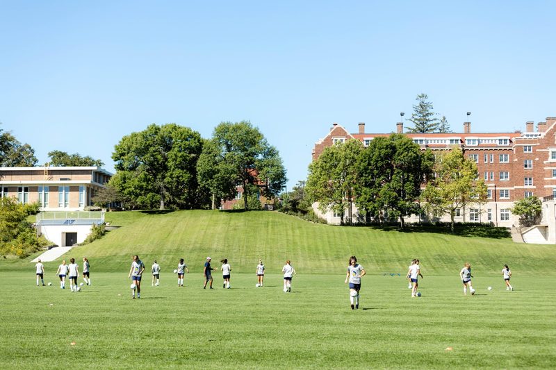 soccer plays practicing on a field