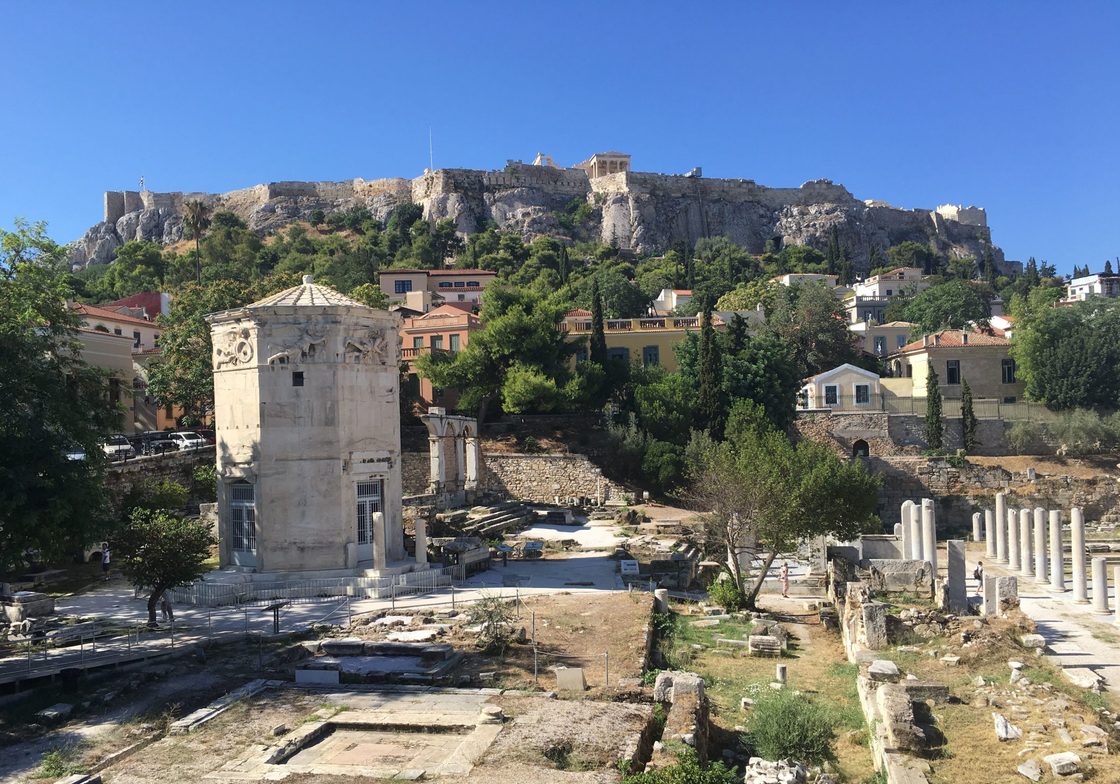 Old and New: Ancient Greek Ruins and Contemporary Houses