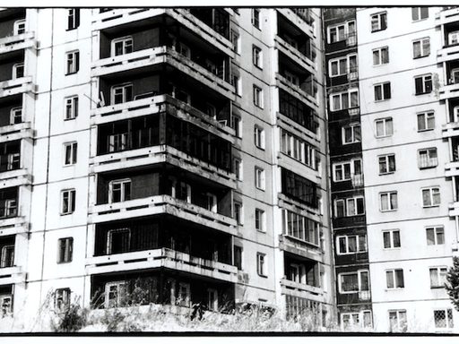Black & white image of an apartment building in Irkutsk, Russia — by Boris Scherbakov