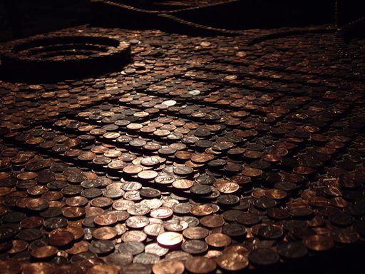 Artwork made of artfully arranged stacks of penny coins by Julia Felix