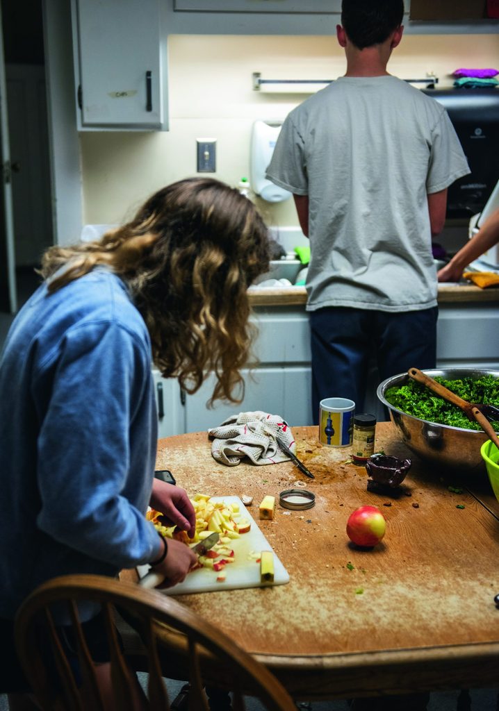 Students preparing harvest dinner