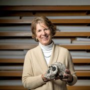 Nancy Wilkie holds a skull