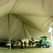 Setting up a tent at Reunion 2019