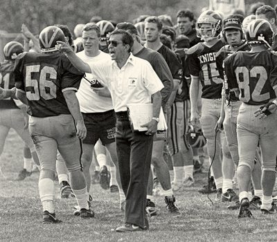 Coah Bob Sullivan with his football team